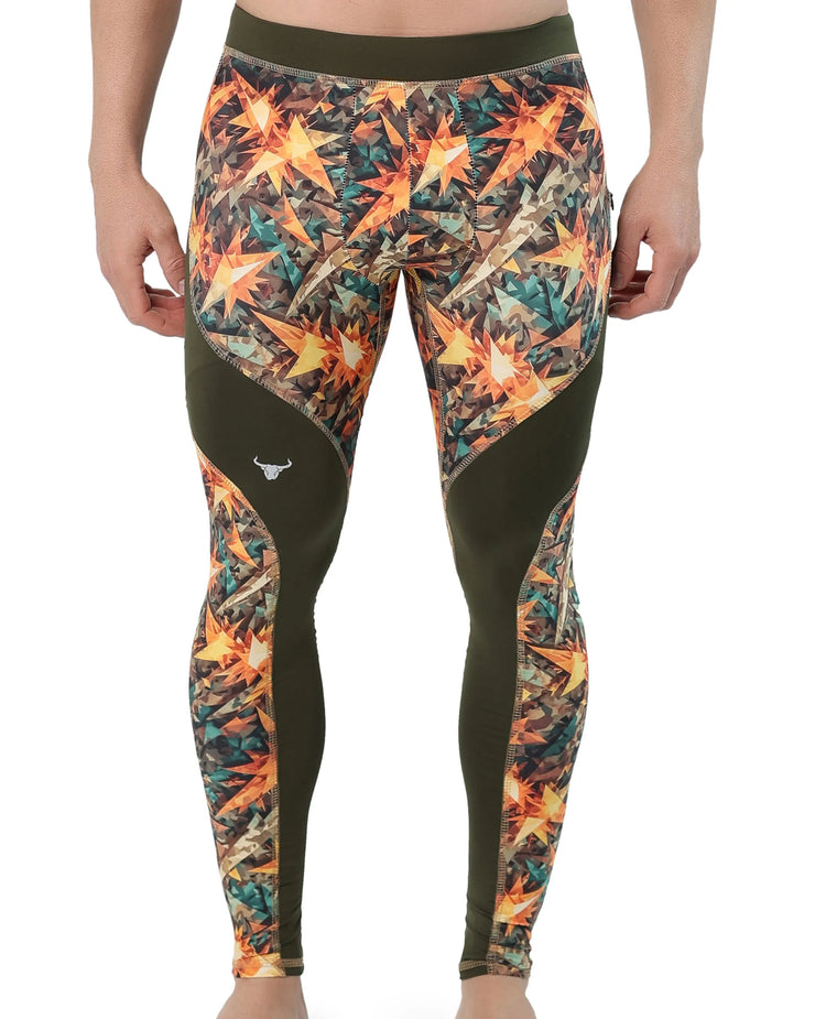 Workout tights for men in a bold camouflage and orange starburst print offer breathable stretch fabric and full-leg compression for performance and recovery.