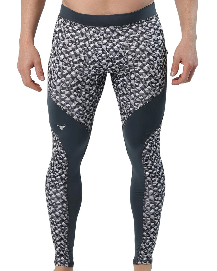 Mens tights with a black and white geometric triangle pattern, accented by solid black panels along the inner thigh and calf for a sleek, modern look.