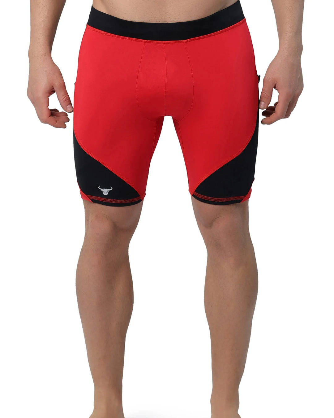 Men's red bike shorts with black contrast panels and logo detail on the left leg.