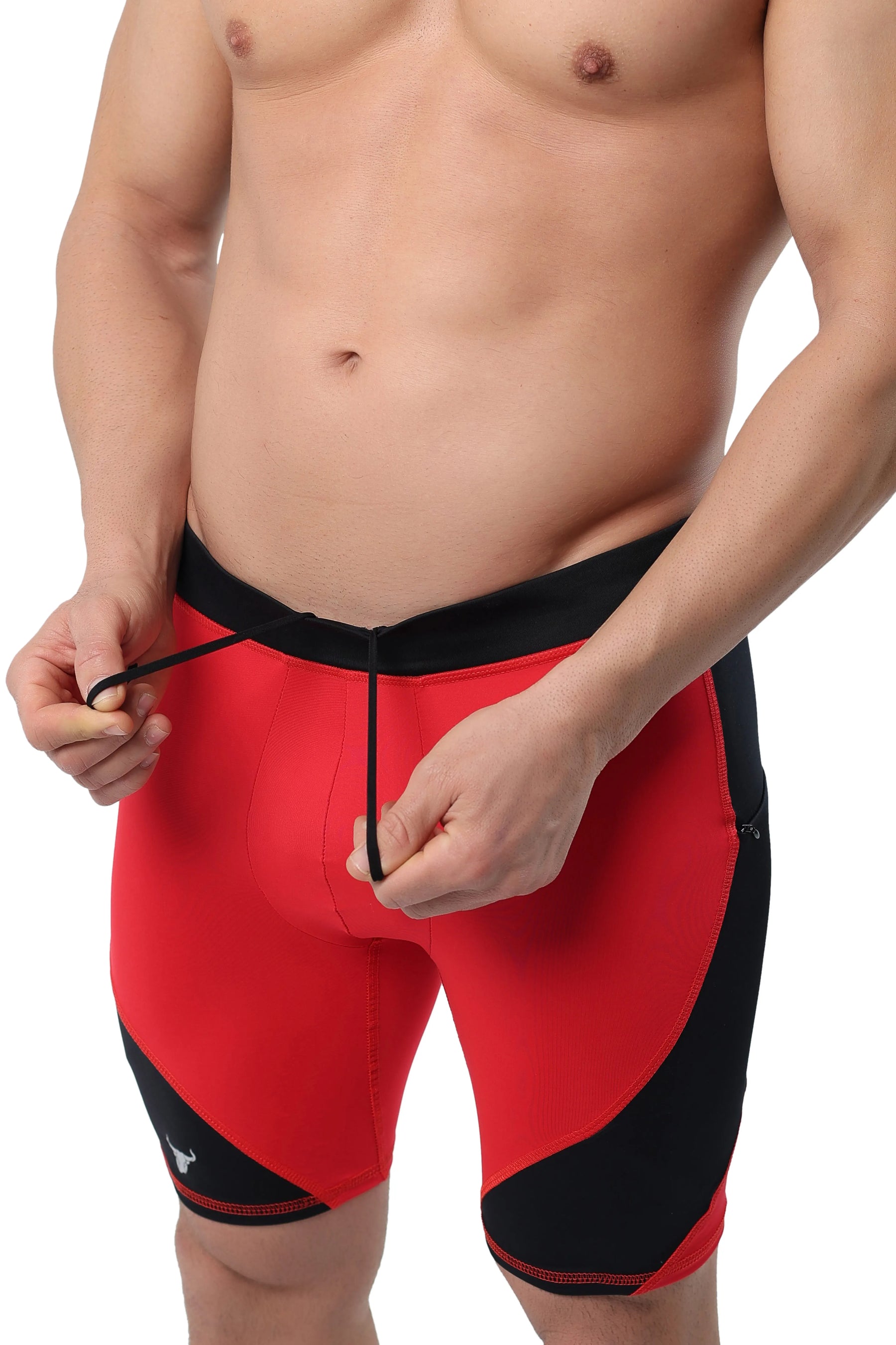 Red compression shorts for men with black panels and adjustable drawstring waistband.