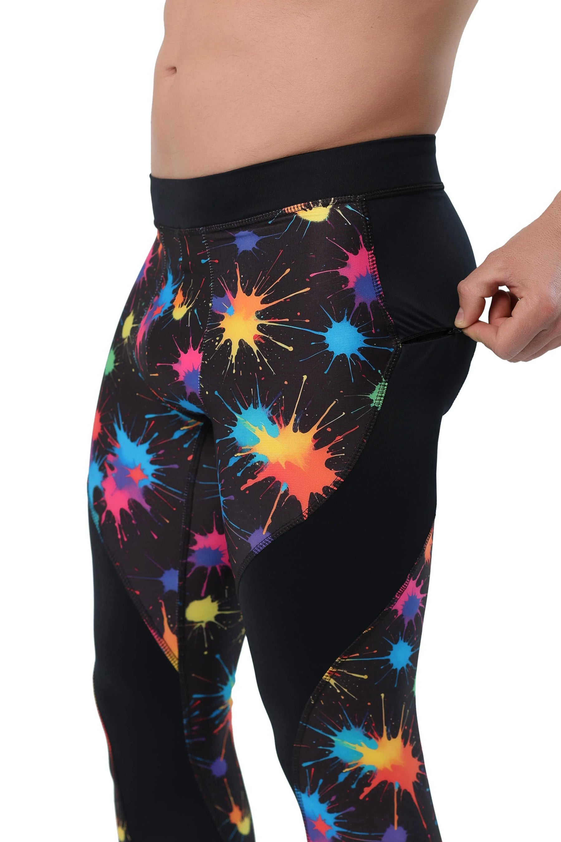 Men's leggings with pockets in black fabric featuring colorful paint splatter pattern.