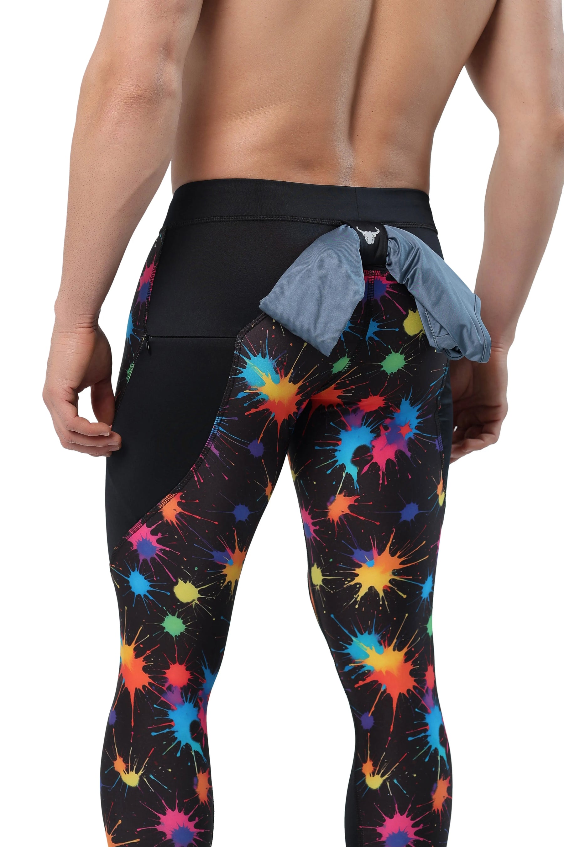 Paint splatter leggings for men featuring multicolor burst print and side storage pocket.