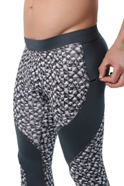 Men's leggings with a zipper pocket, designed for secure storage during workouts, featuring a sleek athletic fit and performance-ready fabric.
