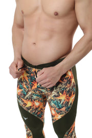Men's printed sports leggings with camouflage-inspired orange and green geometric design and contrast side panels.