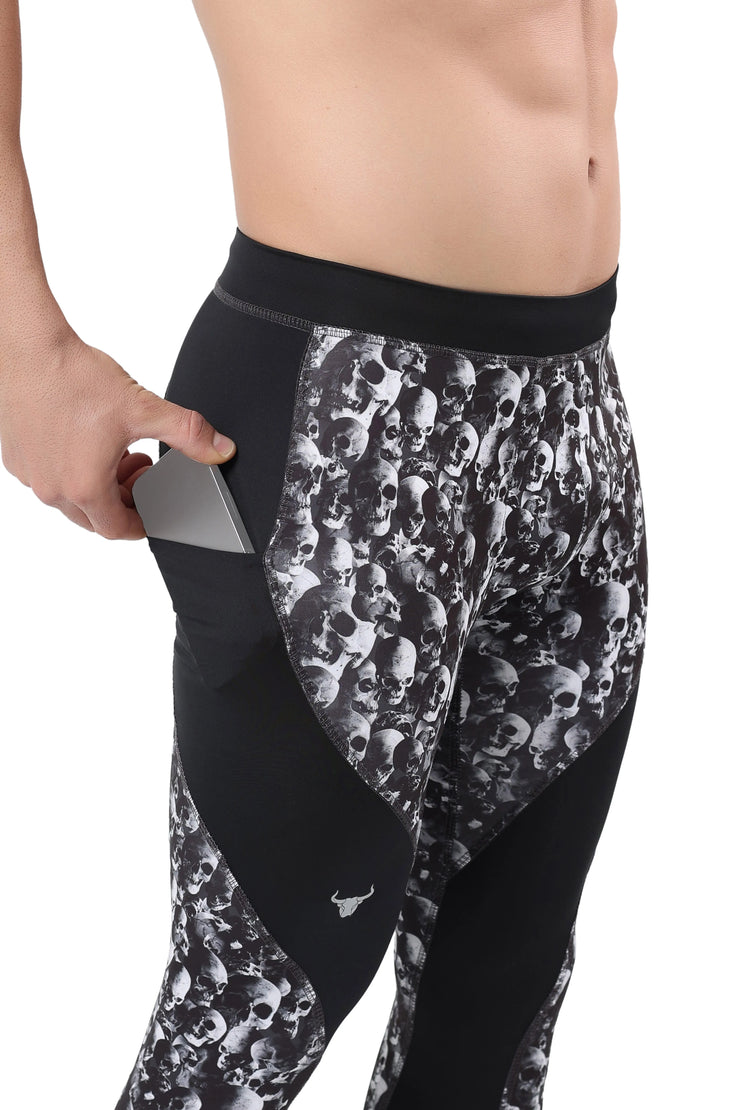 Men's skull compression leggings with side phone pocket and black contrast panels.