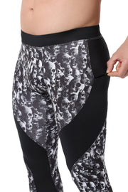 Meggings with zipper pocket featuring a black and white skull pattern and solid black side panels for a bold, edgy look.