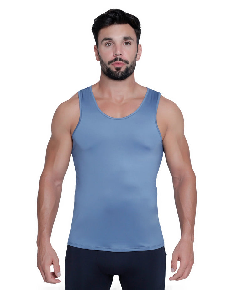 Men's blue tank top worn by a muscular man against a plain white background.