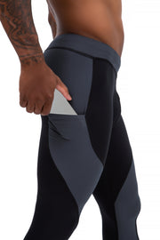 Men's leggings with phone pocket featuring a black and gray color block design, shown with a secure side pocket ideal for storing a phone during workouts or runs.