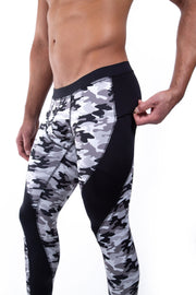 male model wearing black and gray camo full-length meggings