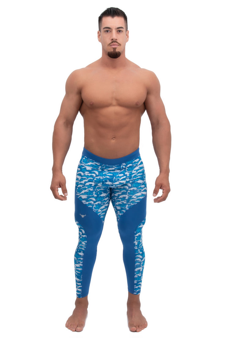 Male model wearing blue tsunami compression pants