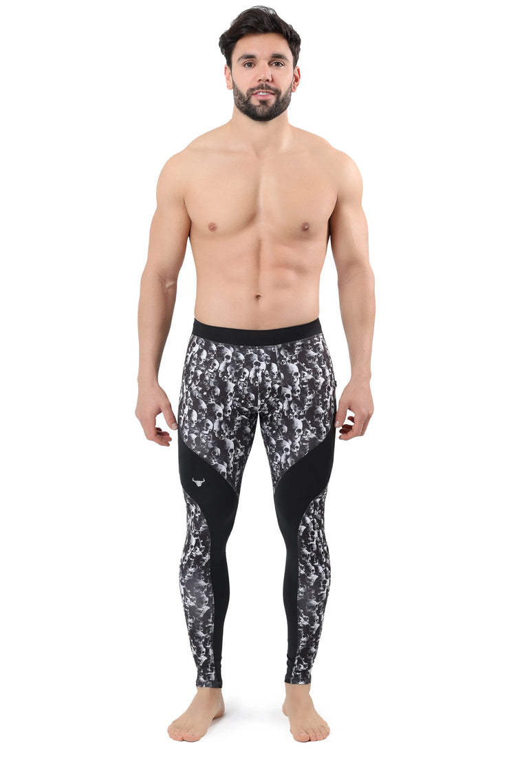 Men's skull leggings with full front skull pattern and contoured black panels for a secure fit.