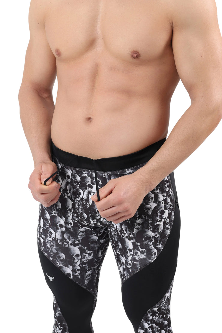 Men's skull leggings with black and white skull print and solid black contour panels.