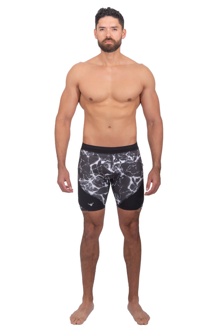 male model wearing black thunder shorts