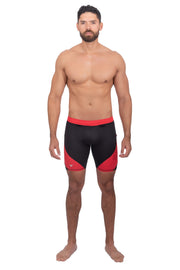 male model wearing black and red compression shorts