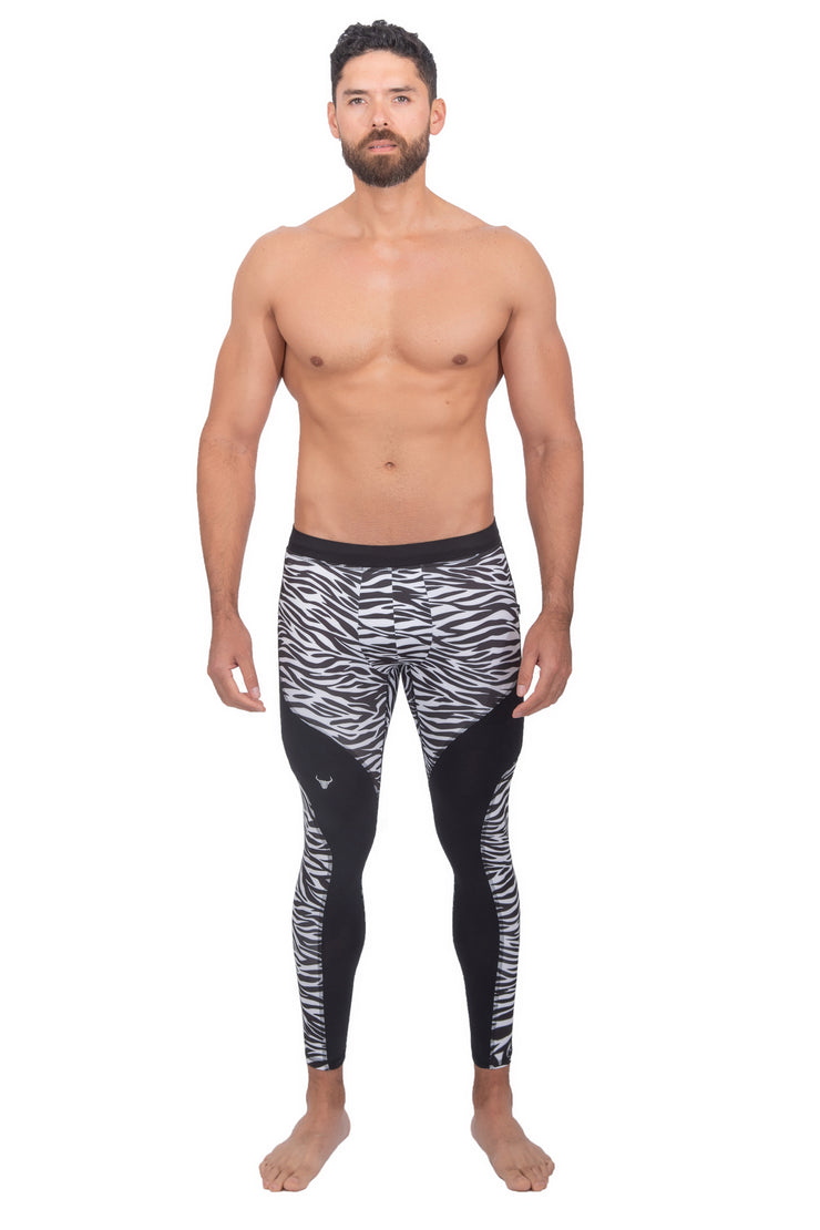 male model wearing full length men's leggings with zebra animal print design