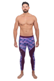 male model wearing purple stars full length men's leggings
