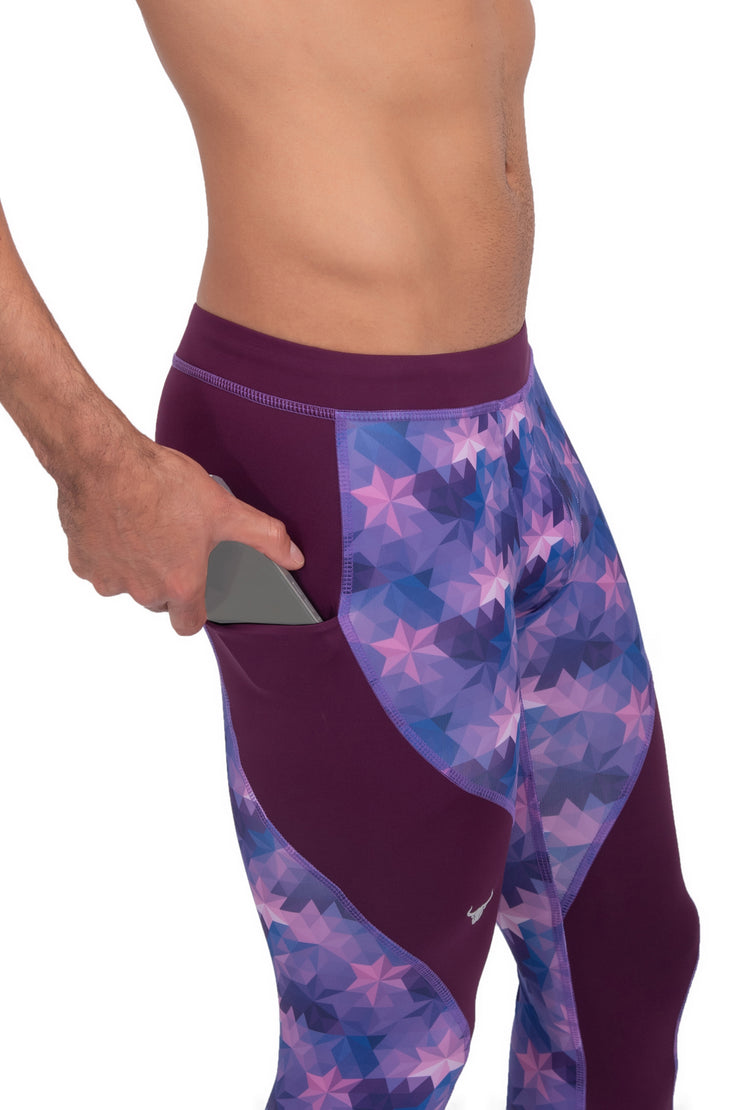 side view of purple stars full length compression pants for men with phone pocket