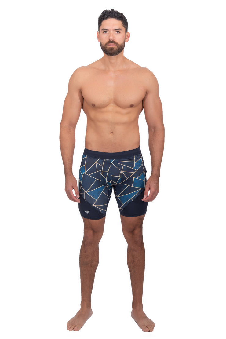 Male model wearing printed triangle compression shorts