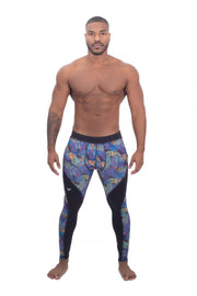 male model wearing neon leaves full-length leggings