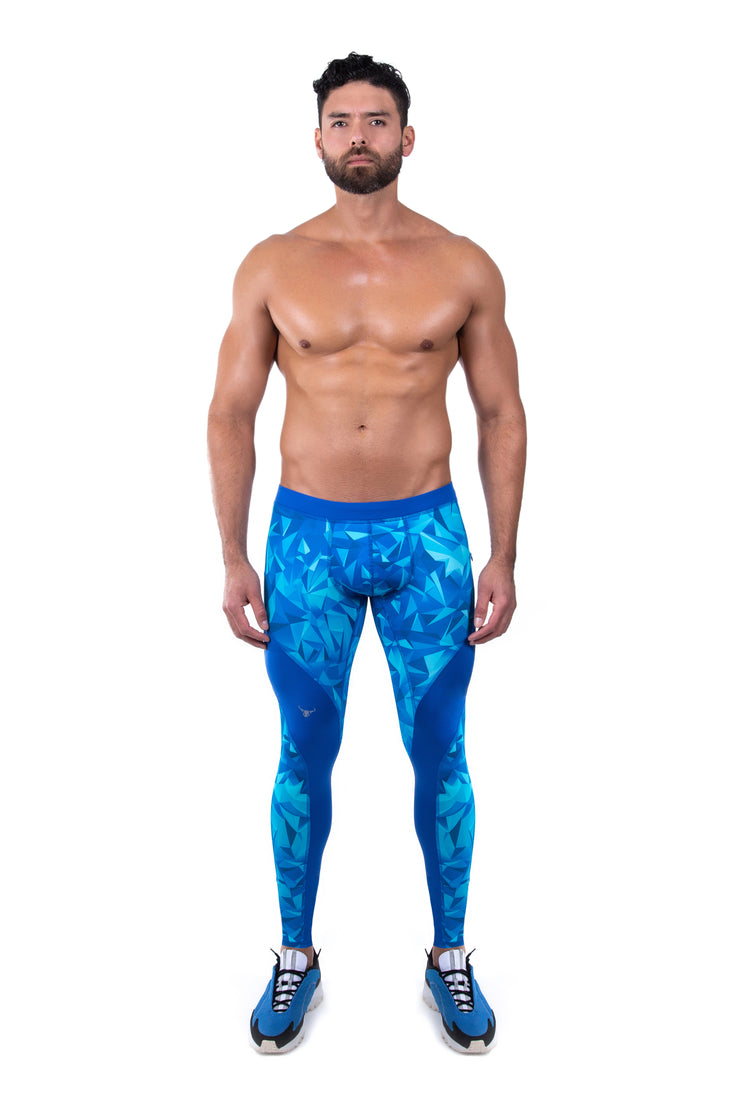man wearing ocean blue compression pants