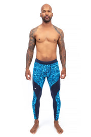 male model wearing blue lighting performance leggings