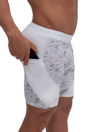 side view of white marble printed men's performance shorts with phone pocket