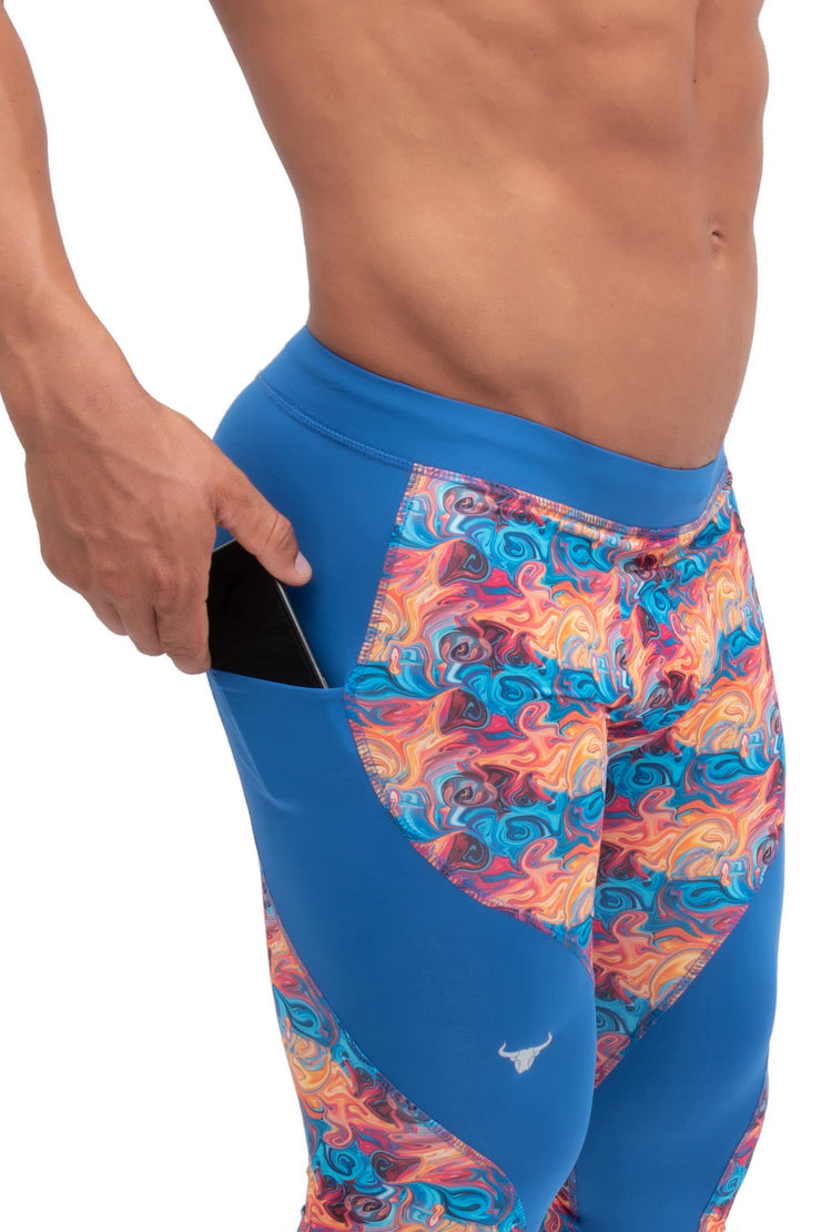 mens leggings | side view of men's blue abstract leggings with phone pockets
