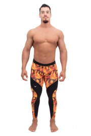 Male model wearing orange starburst compression leggings for men