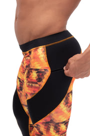 Orange starburst men's leggings with secure zip pockets