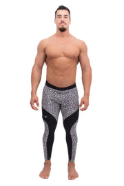 Male model wearing snow leopard animal print compression pants