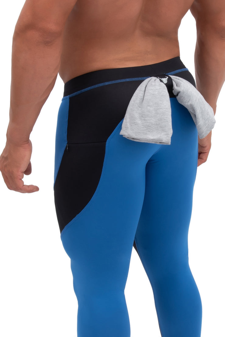 back side of blue and black performance leggings for men